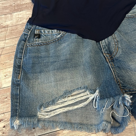 Pinkblush Full Belly Panel Distressed Raw Chewed
Hem Denim Maternity Jean Shorts - Picture 6 of 11